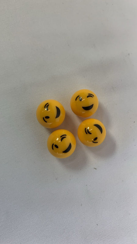 Winky face emoji valve caps