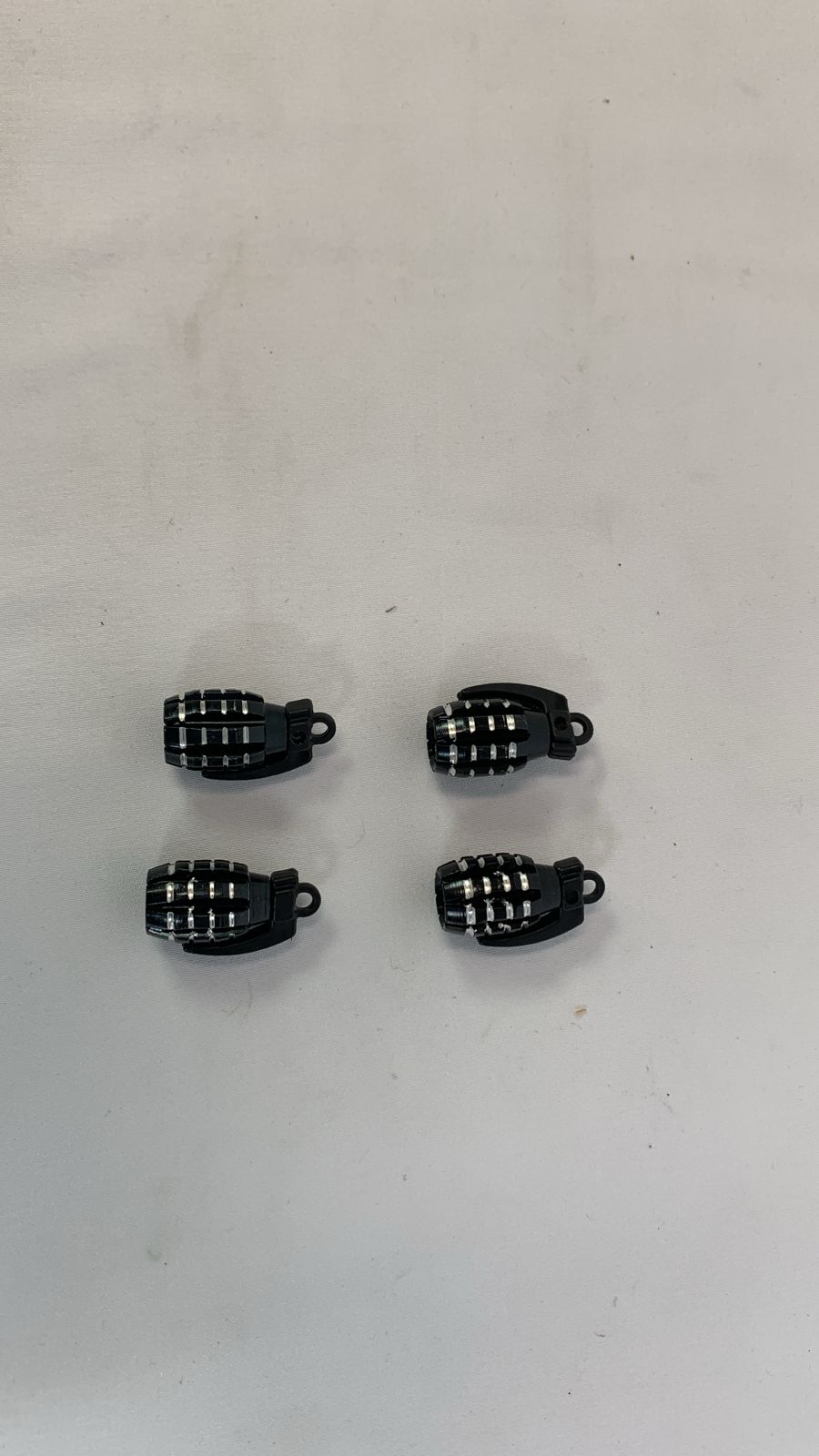 Grenade black valve caps
