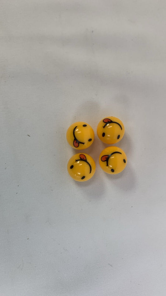 Smiley face emoji valve caps