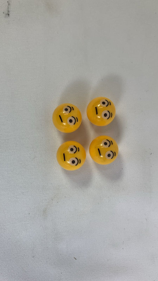 Surprise emoji valve caps
